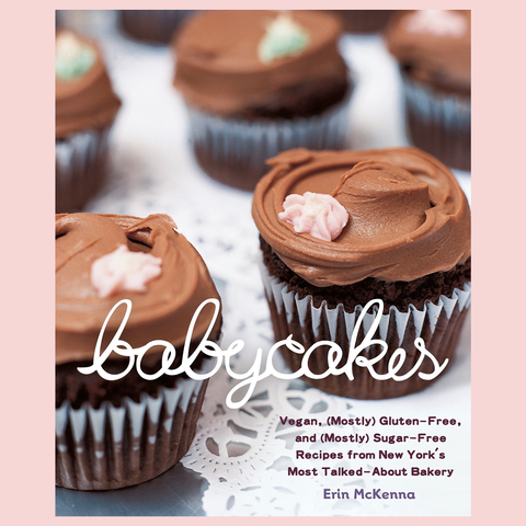 A closeup of a cookbook with chocolate cupcakes on the cover